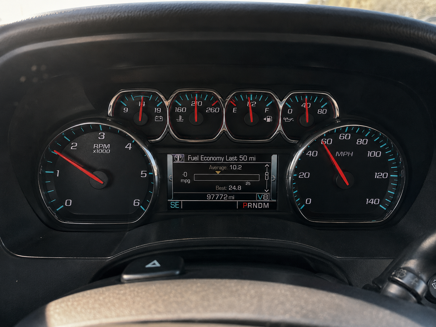 GM truck dashboard showing full V8 mode locked while driving