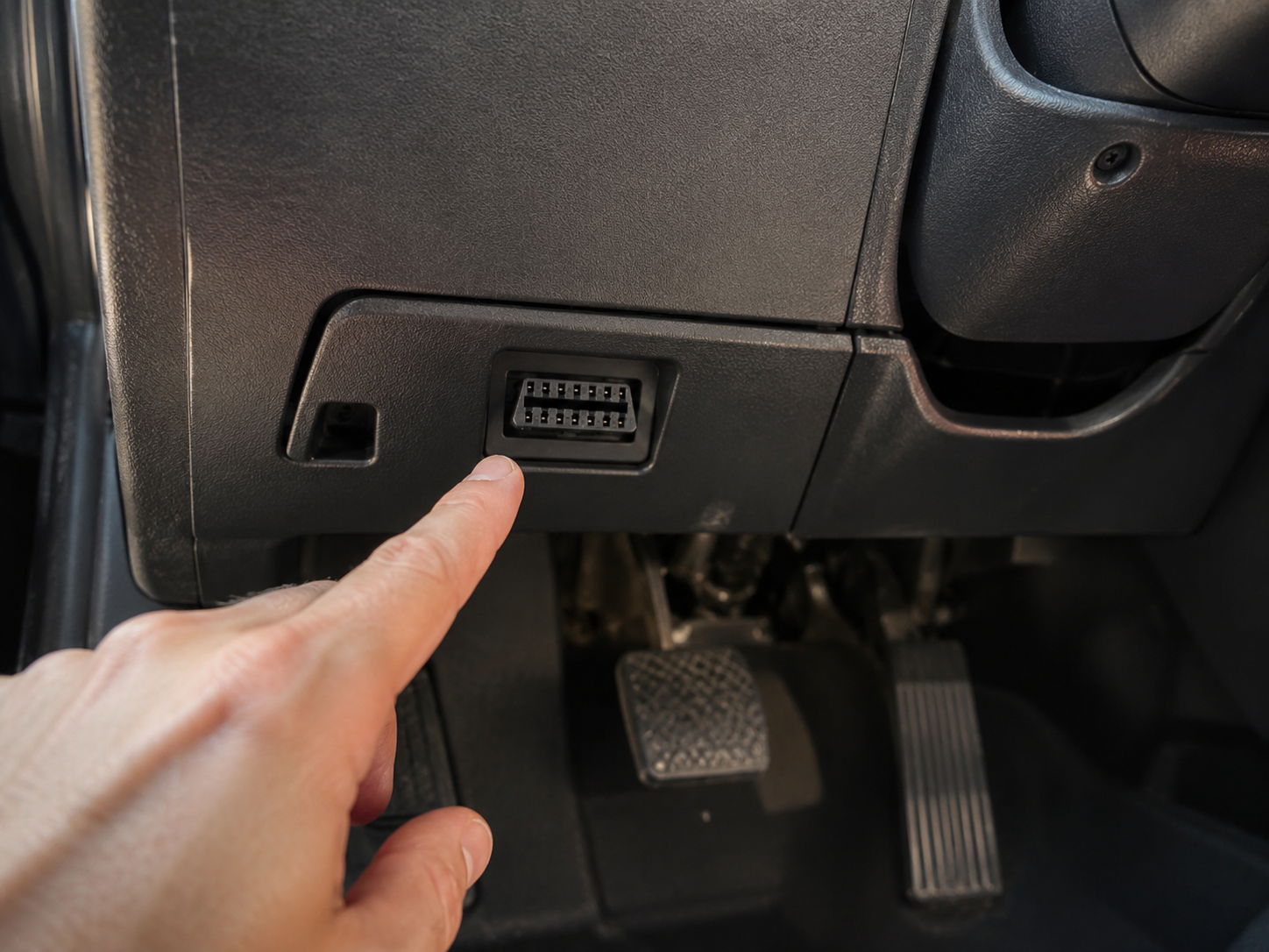 Locating the OBD II port under a GM truck dashboard